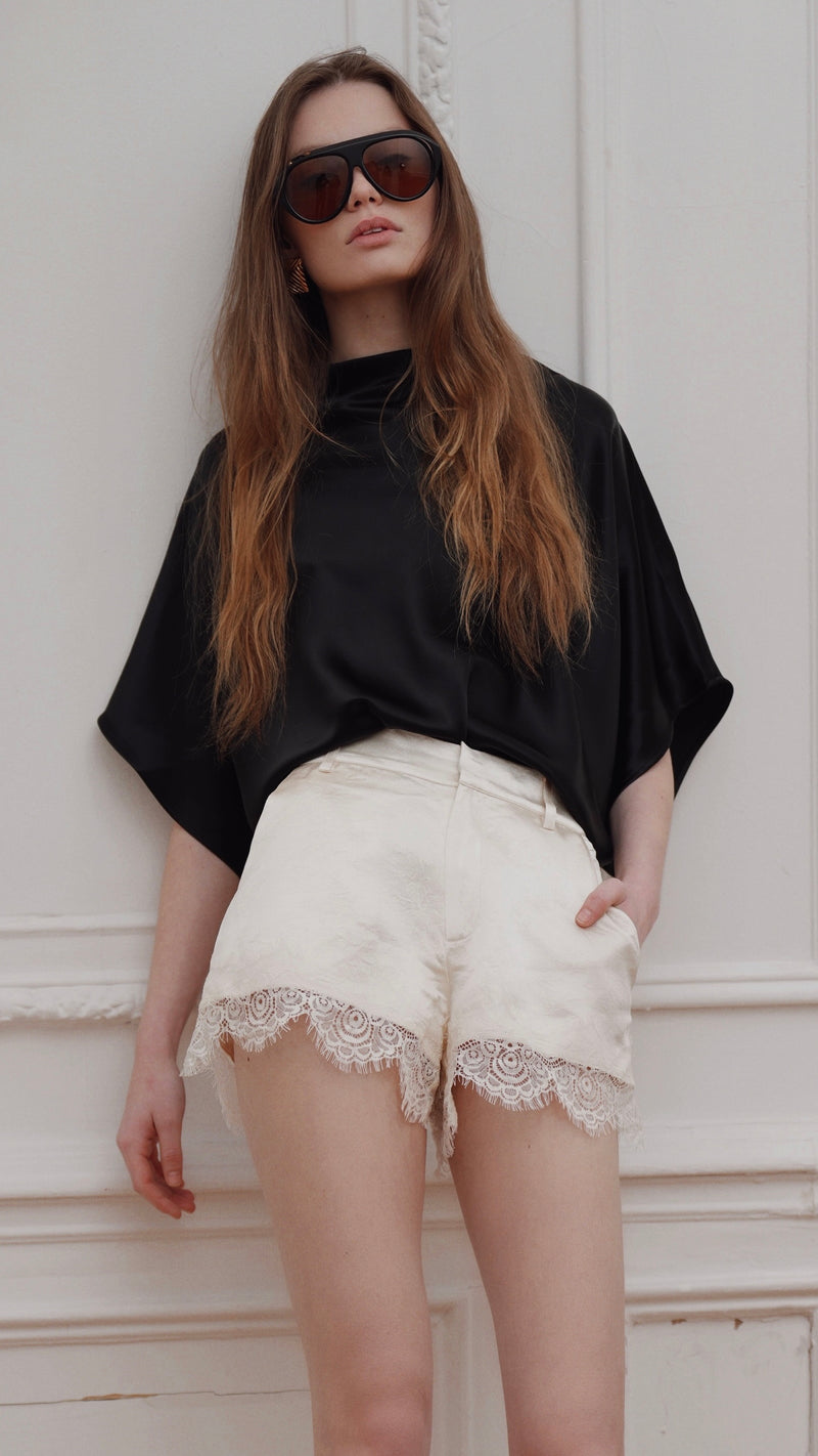 Corinna Short styled back to the Olympia Top